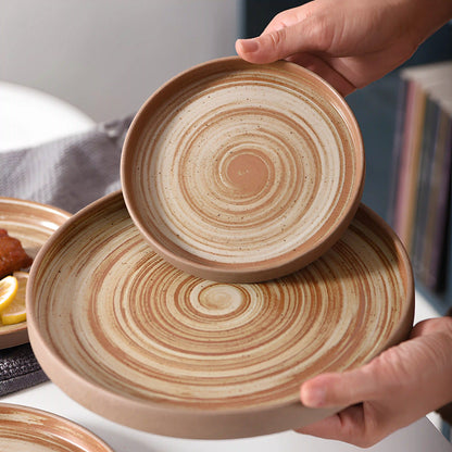 THE SANDSTONE PLATE