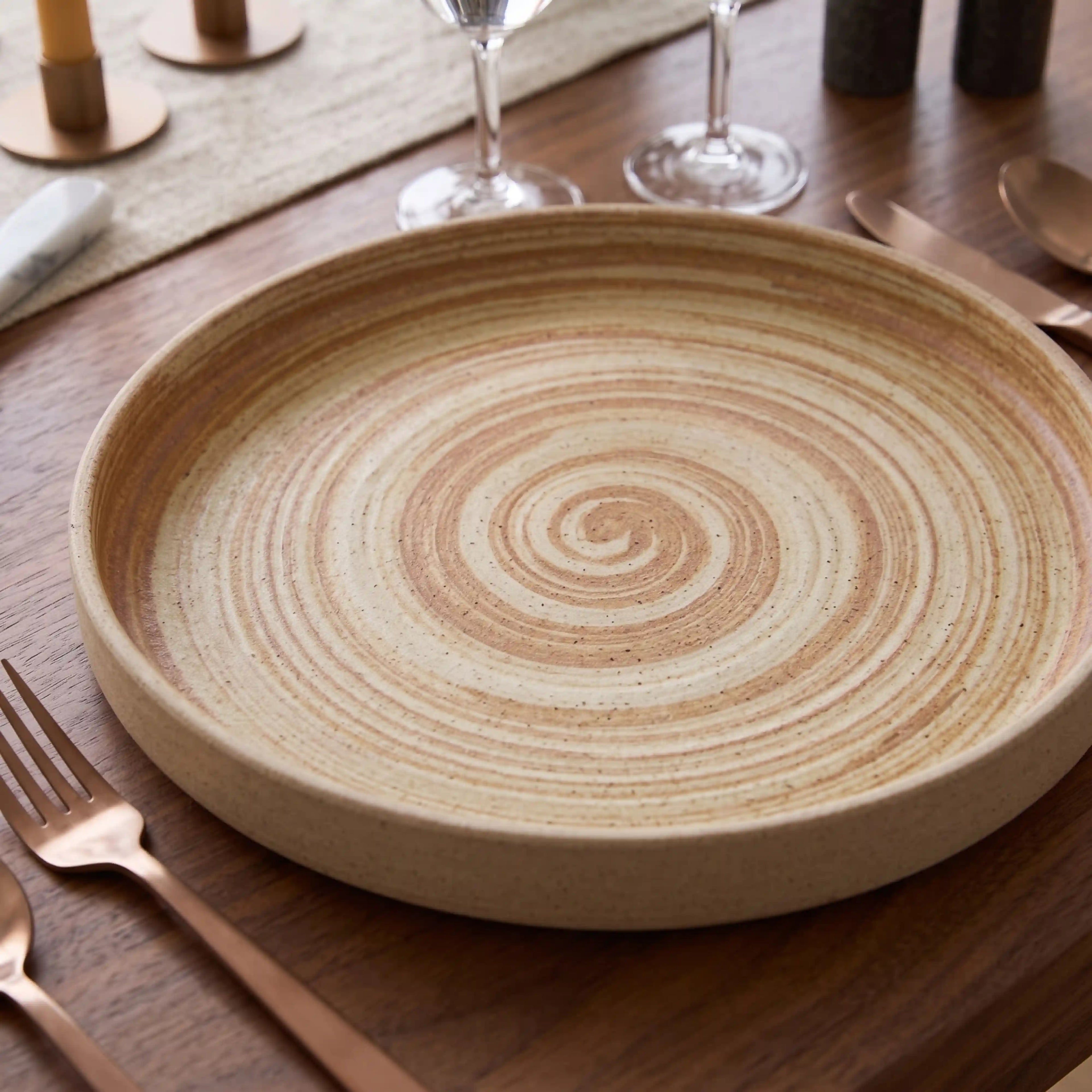 THE SANDSTONE PLATE